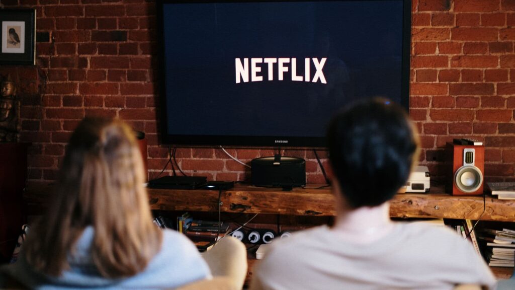 A couple watching Netflix