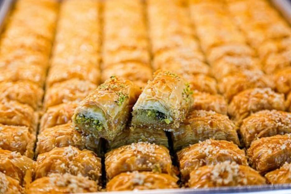 A big dish full of baklava.
