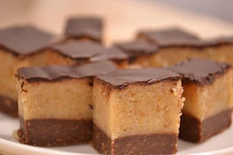 Small cake with chocolate on top.