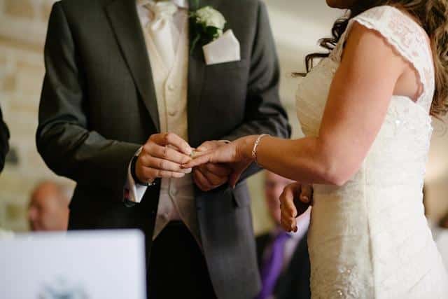 A bride and groom getting married.