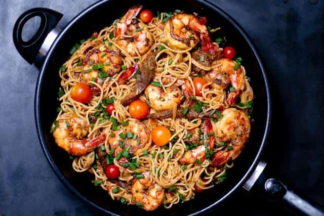 Seafood pasta in a skillet.