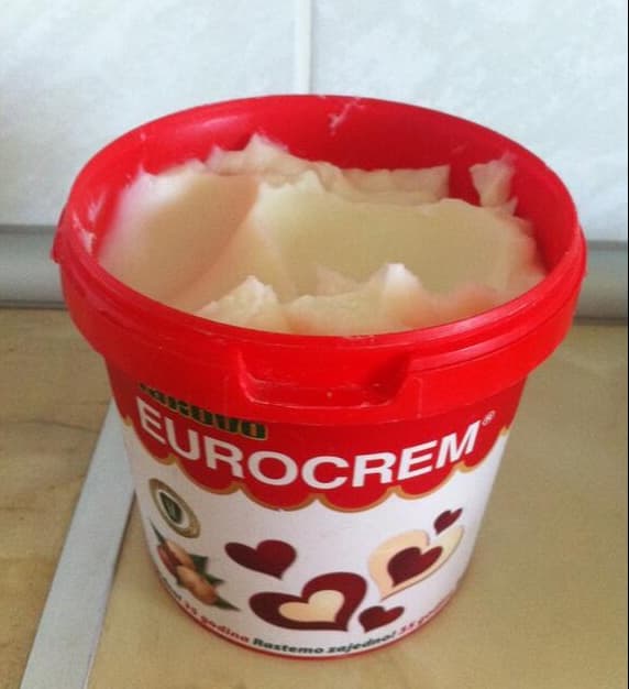 A hazelnut spread tub full of pork fat.